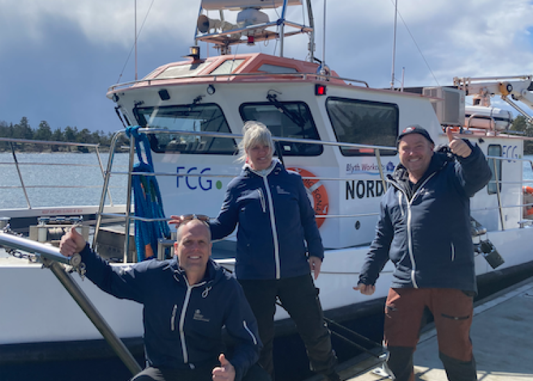 Askö staff members standing in front of our new research vessel