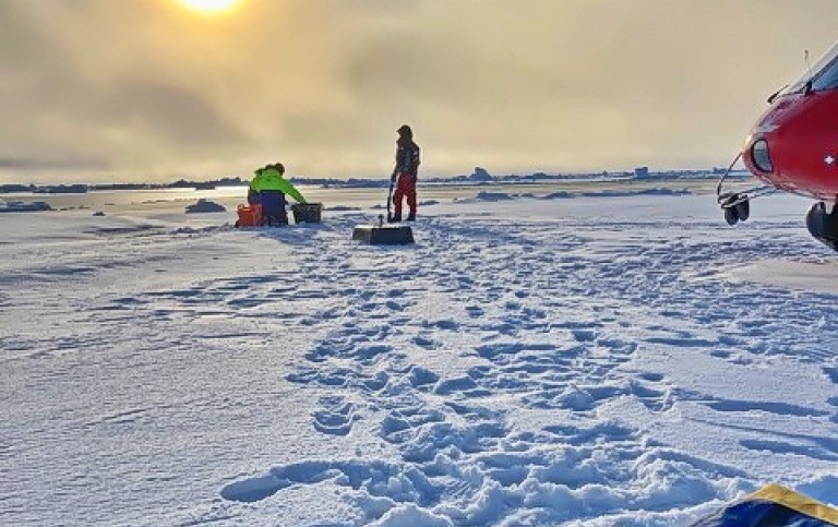 Scientists retrieving fish traps on the ice in the Arctic. Photo: Sonja Murto