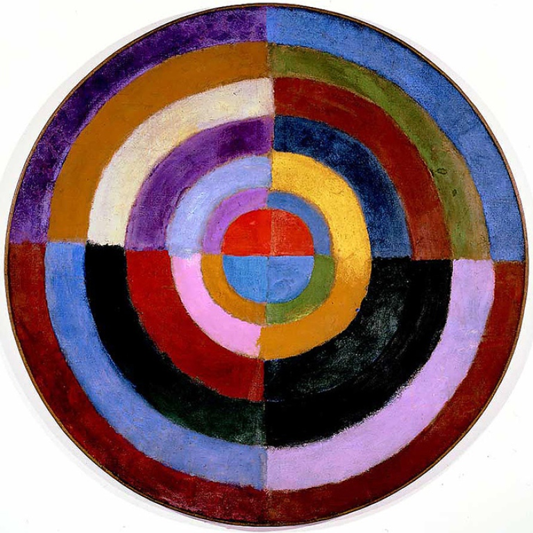 Konstverk föreställande cirklar i olika färger i varandra som bildar en gemensam
