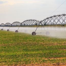 Large agricultural irrigation system in a field.