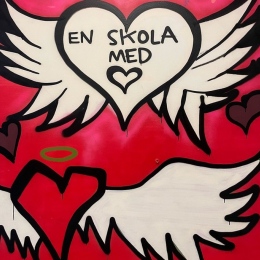 A heart w. wings and Swedish text 