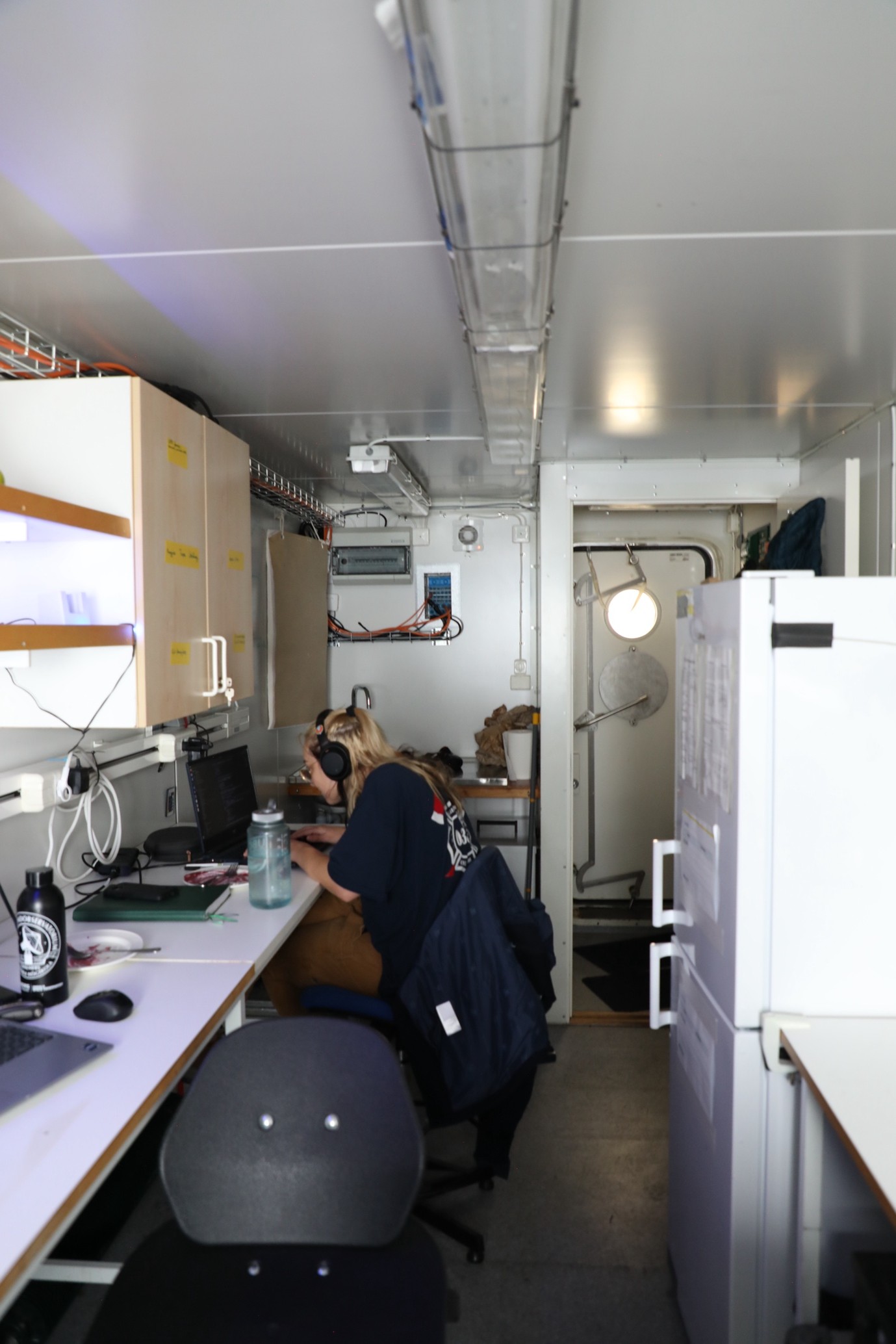 Caption: Missy Westland (University of British Columbia) analyses the data from the meteorological instruments