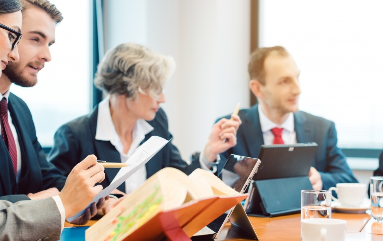 Lawyer teams negotiating an agreement