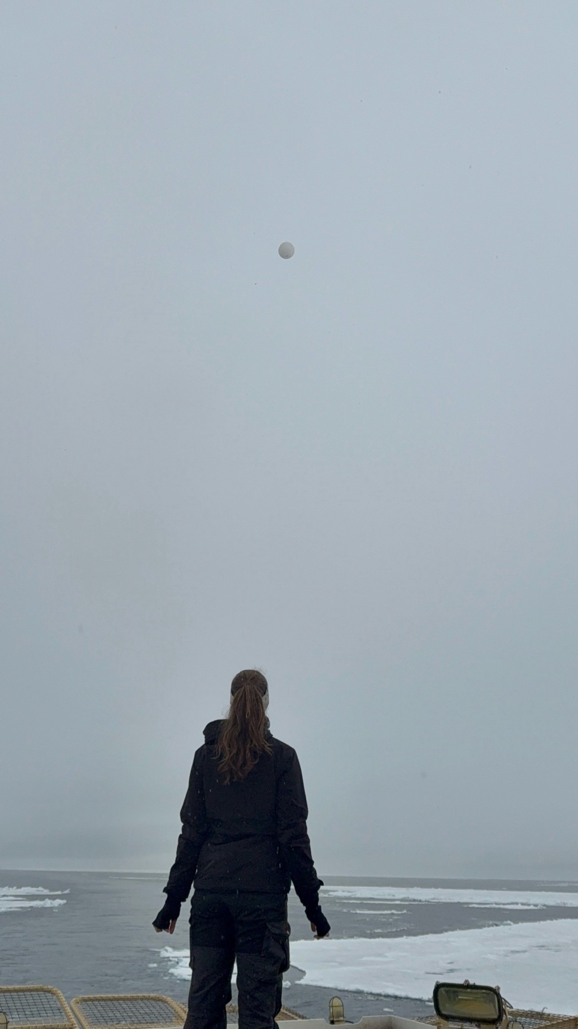Image: Linnea watches her balloon disappear into the clouds, hoping for good measurements.