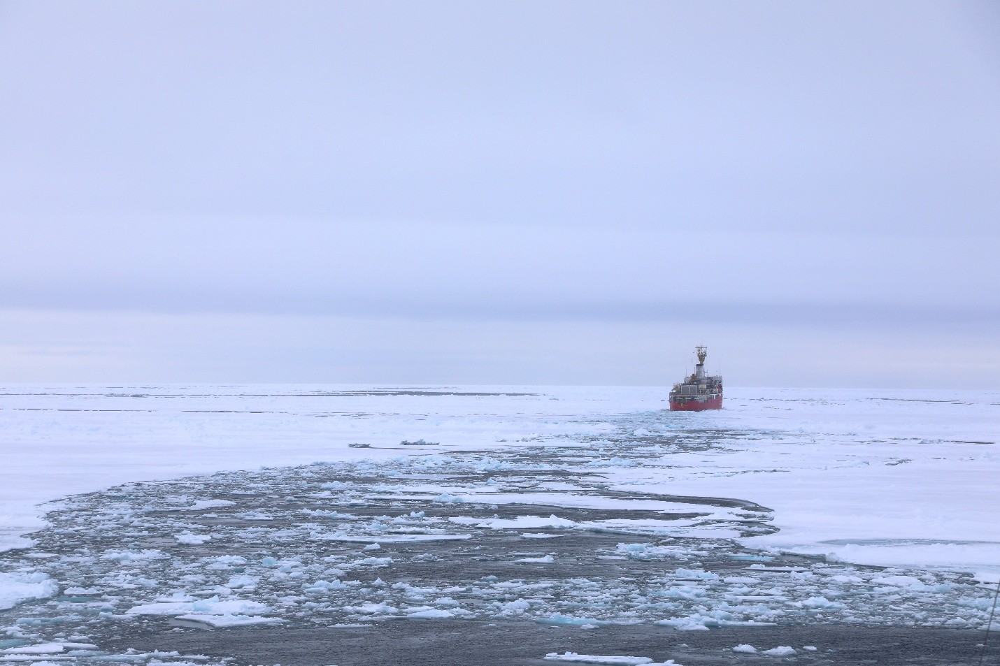 Image: The Icebreaker Louis S. St. Laurent can be seen from Oden as they move northward in the Arctic sea ice.