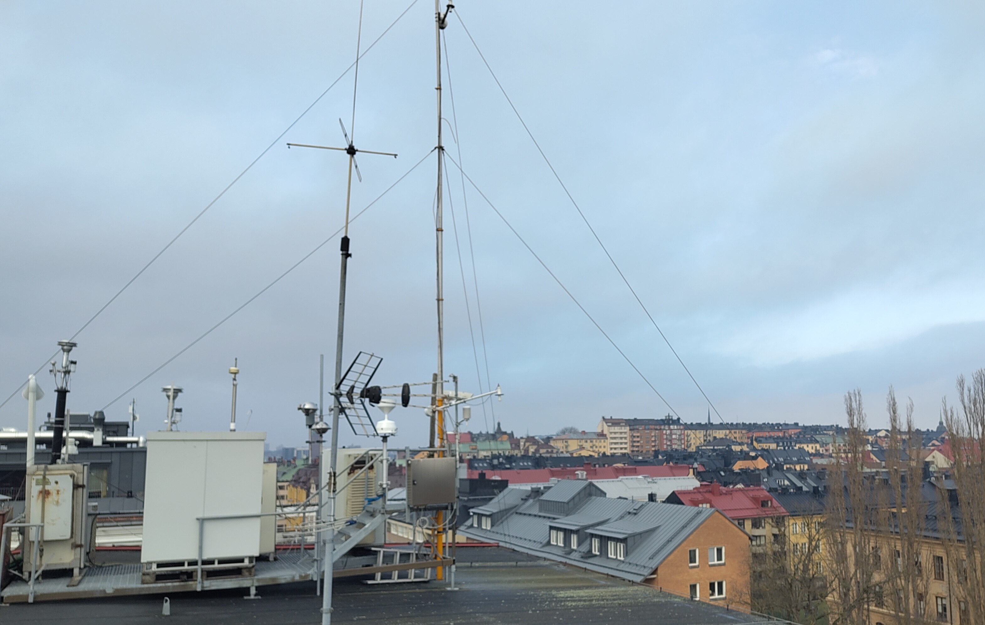 View of sampling site showing instruments for aerosol sampling and roof tops in Stockholm.
