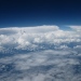 Photograph: Radovan Krejci, co-author of the study. On this picture, thin mid-level clouds are observed in the foreground with deep convective clouds in the background.