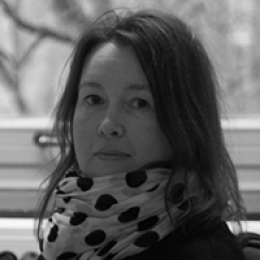 Petra Lindfors at desk in office at Stockholm University, Department of Psychology