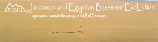 a little crab on desert sand, with image title "Jordanian and Egyptian Basement Evolution"