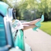 Fifties car with with high heeled shoes