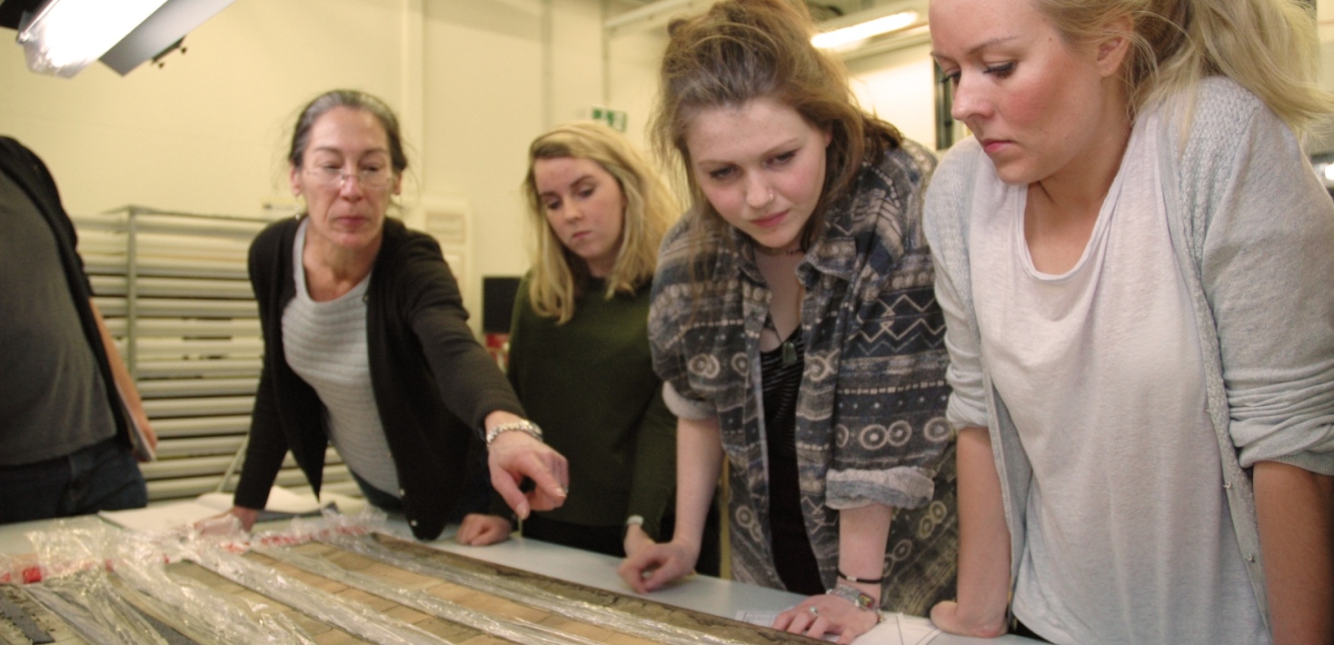 Students looking at sediment cores. Photo: Private