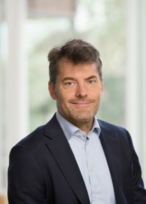 Foto på Mathias Herzing, docent vid Nationalekonomiska institutionen.