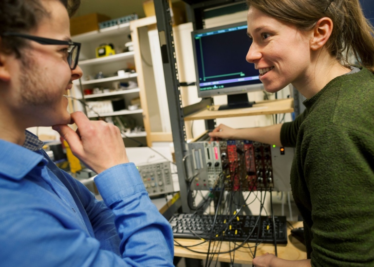 Students in front of laboratory equipment