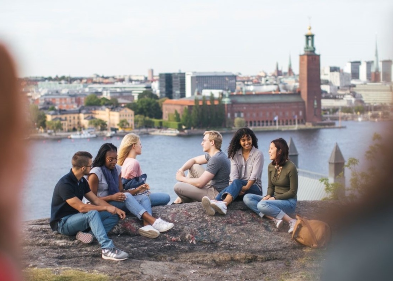 Students on a view mountain with a beautiful view of Stockholm.