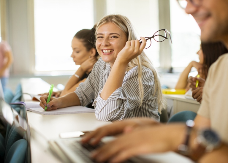 University students in classroom. Photo: Boggy/Mostphotos.