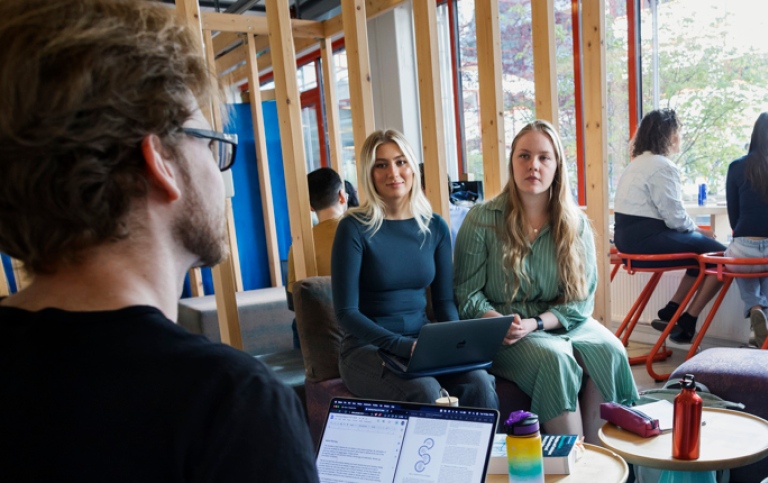 A group of students in a discussion. 