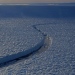 A crack in Petermann Ice Shelf observed by an international team of scientists during the Oden expedition in 2019. These cracks can eventually grow across the entire ice shelf, leading to the release of large icebergs to the ocean. Photo: Martin Jakobsson