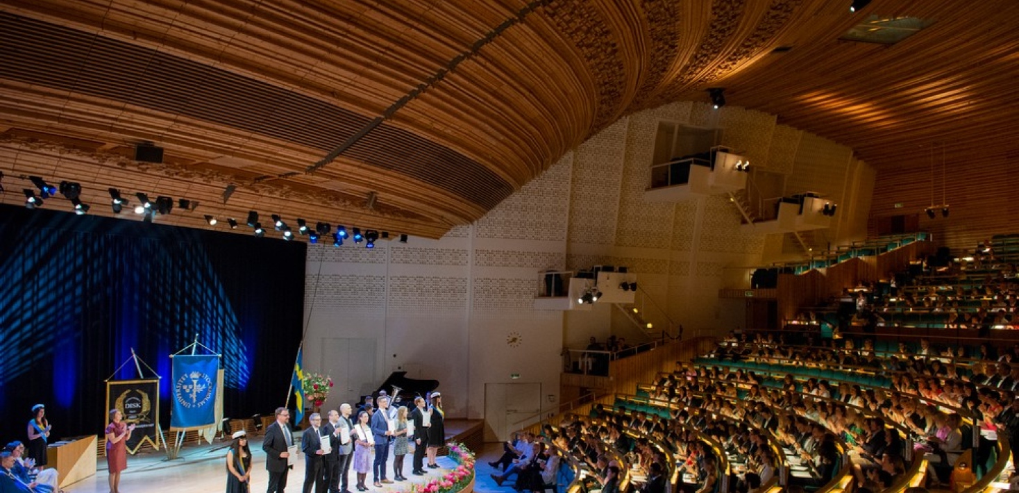 Studenter tar ut sin examen - Magisterpromotion i Aula Magna 2019.