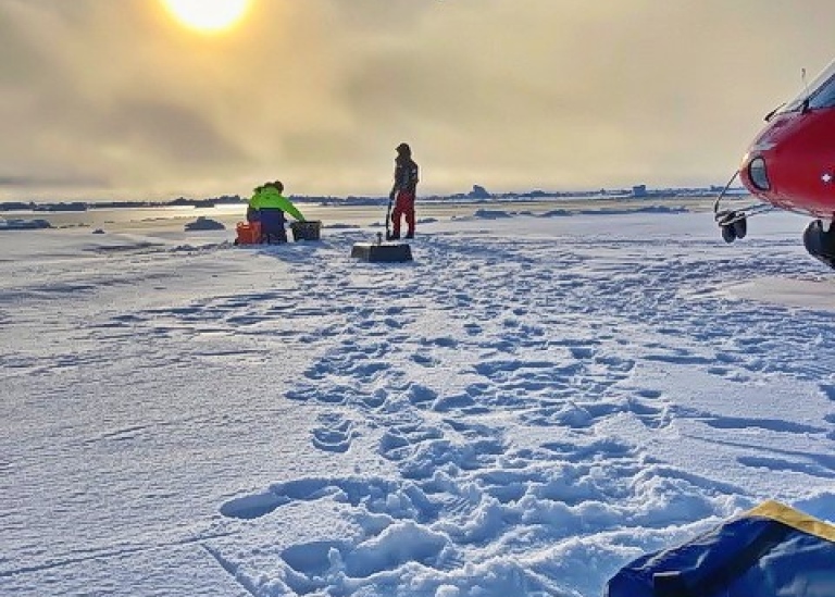 Scientists retrieving fish traps on the ice in the Arctic. Photo: Sonja Murto