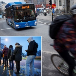 Trafikbild och människor som köar till en buss.