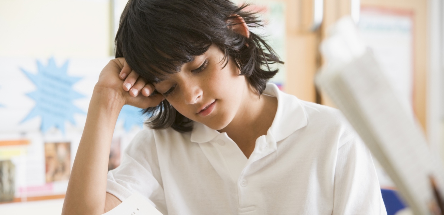 A boy reading a book