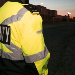 Security guard in the street in the early morning. Photo: Flex Point Security on Unsplash.