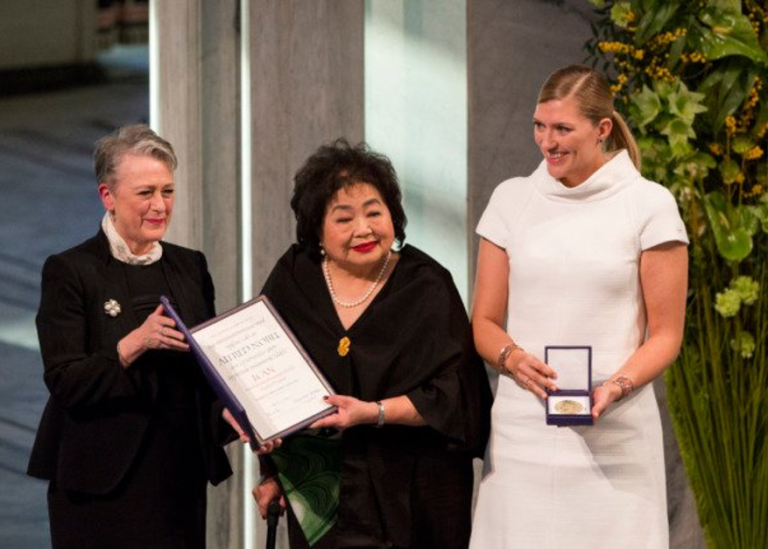 Beatrice Fihn (right) receiving the Nobel Peace Prize. Photo credit: ICAN/Jo Straube