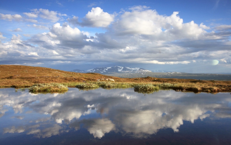 Lake in Jämtland with Sylarna mountains in the background. Photo Stefano Manzoni.