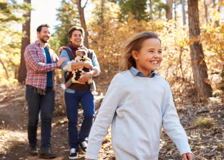 Family walking in the woods