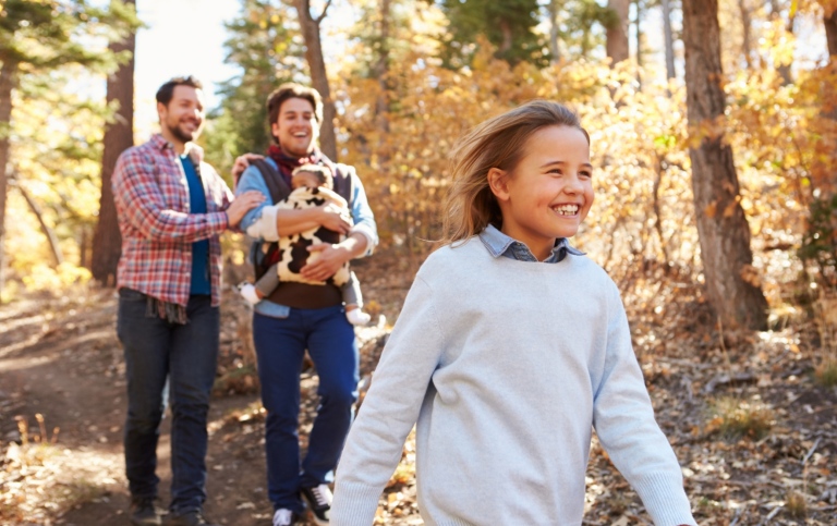 Family walking in the woods