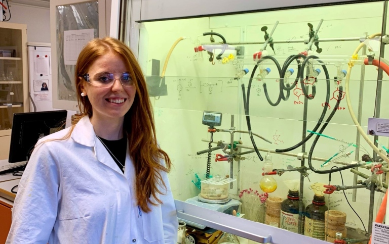 Erika Linde in front of fume hood