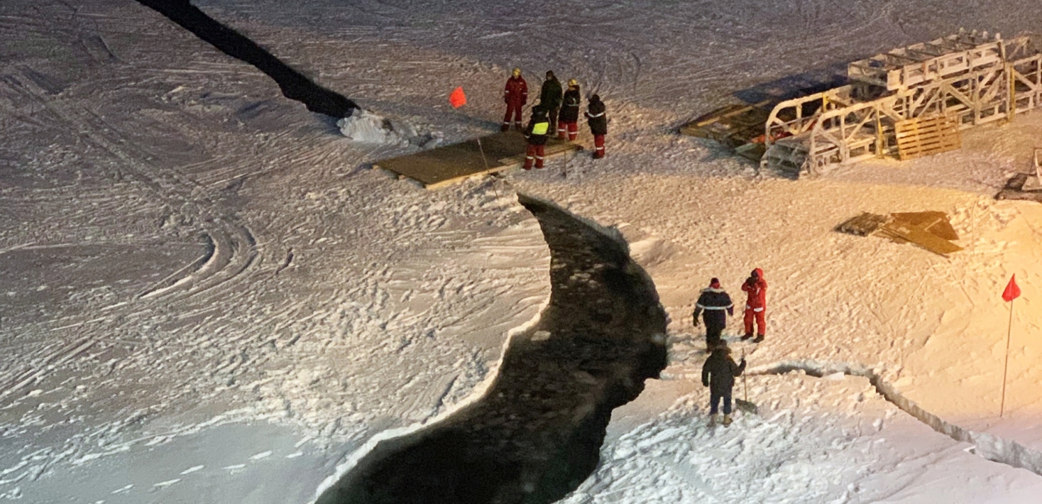 A crack in the ice next to the icebreaker