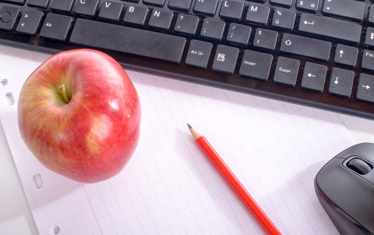 Keyboard, mouse, apple, pen and paper.