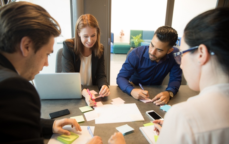 People sitting at a meeting in an office