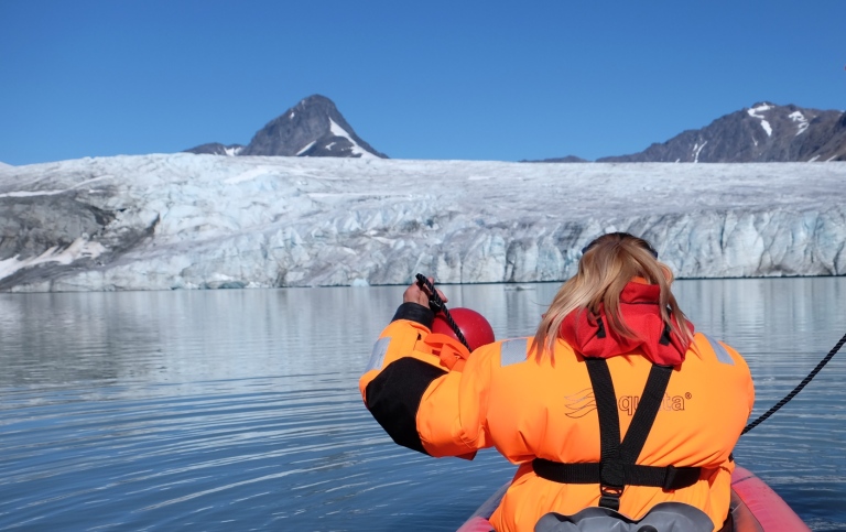 Field work in Salajiegnas near the calving glacier front. Photo Eva Gylfe.