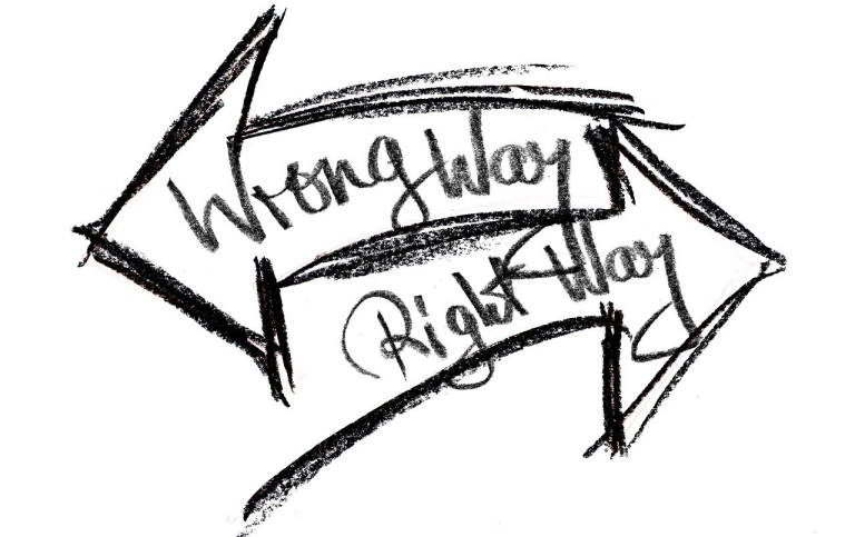 Tecknade pilar med texten Wrong Way Right Way. Foto: Gerd Altmann.