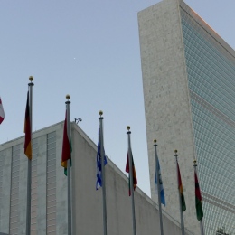 Flags in front of a building.