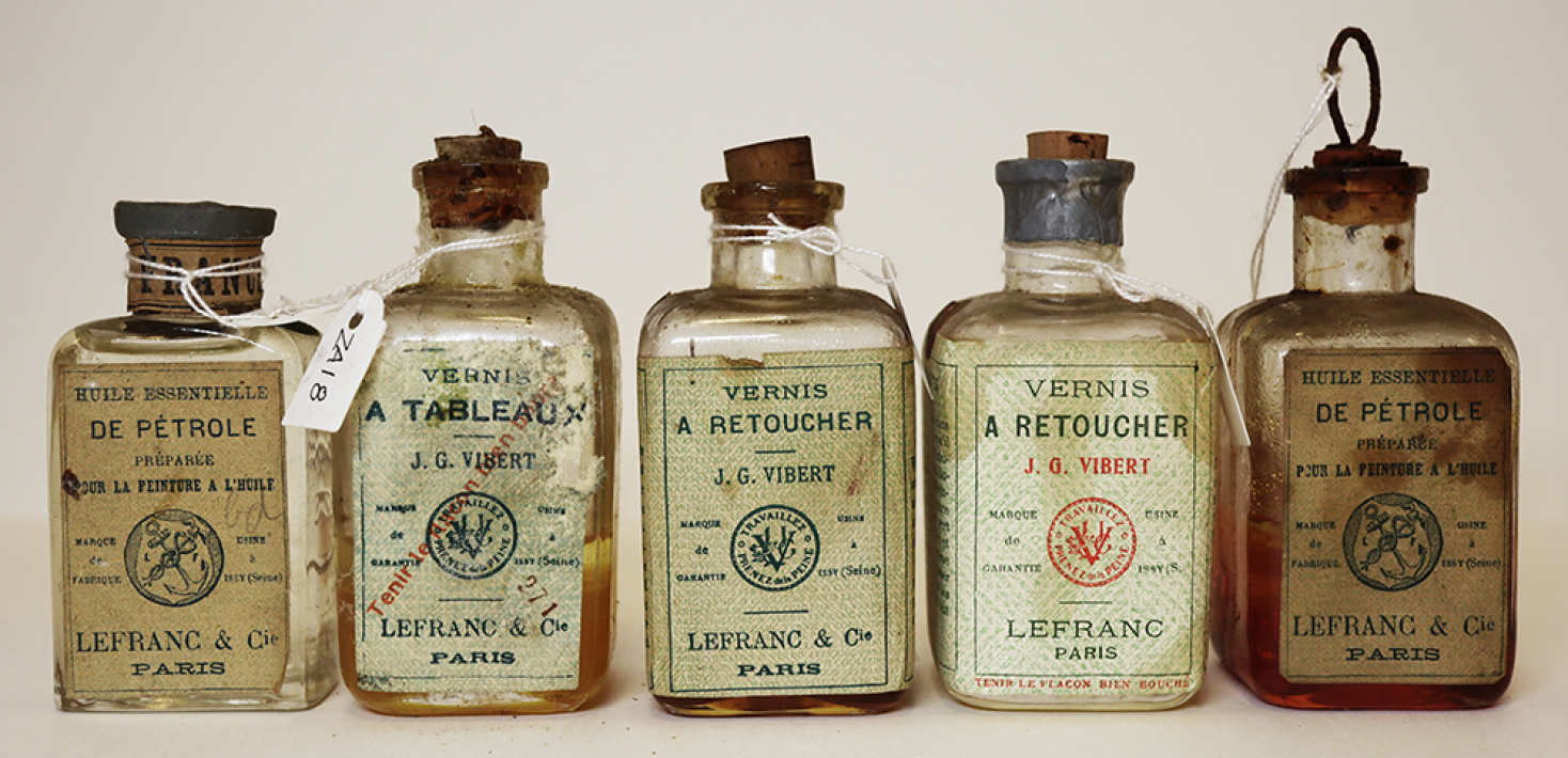 Five small bottles of varnish, from the early 20th century.