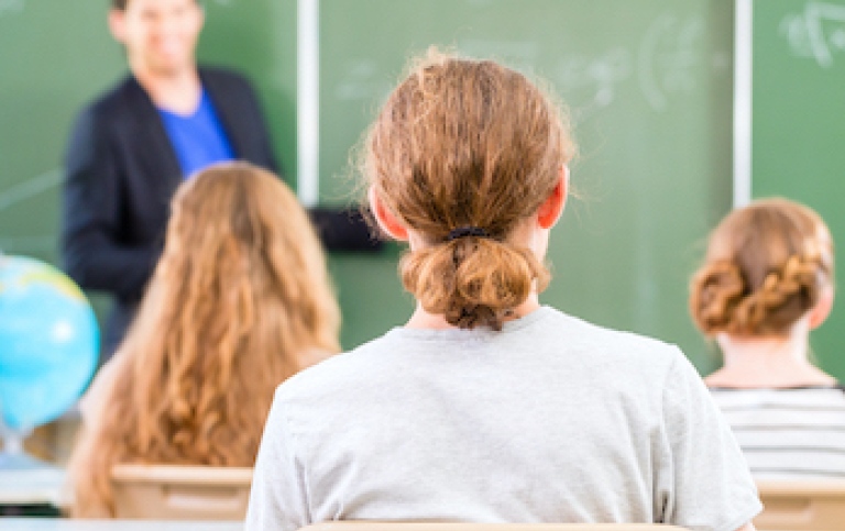  Students in a class room has a math class 