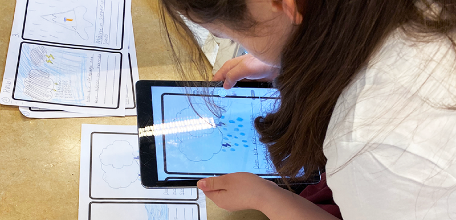 A girl who makes a multimodal text creation with pictures