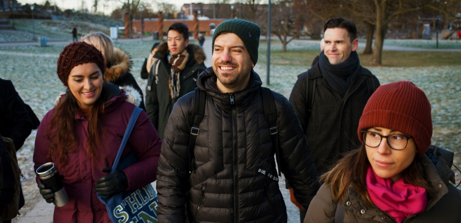 A group of students on campus in the winter.