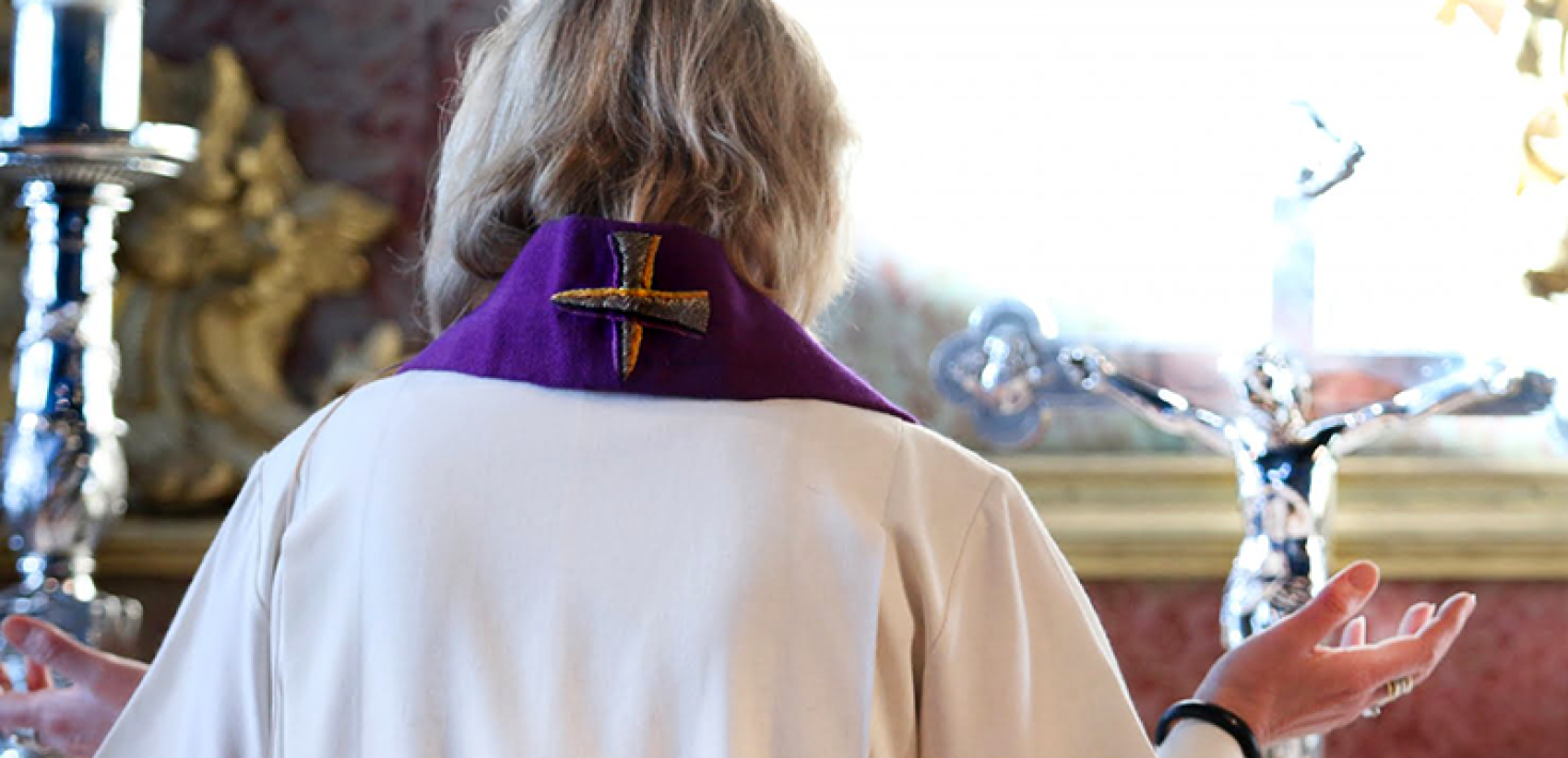 A priests from behind