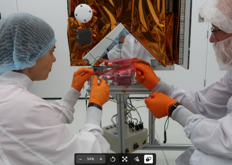 Two persons working on the MATS satellite. Photo: OHB Sweden