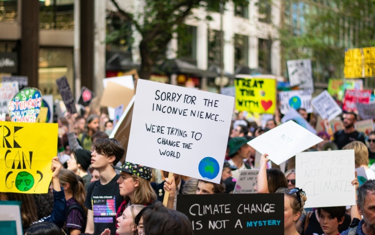Young people protesting in the streets against climate change