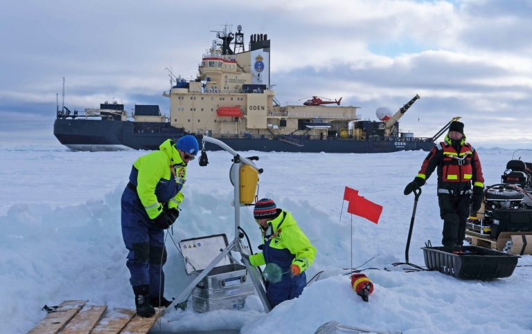 Ice work with IB Oden on the background. Photo: Noemie Planat