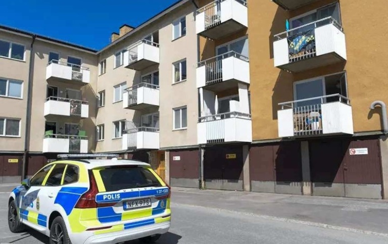 Police car in housing area.