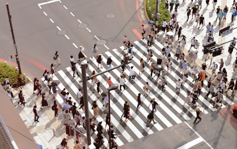 Crowd of people on a pedestrian crossing