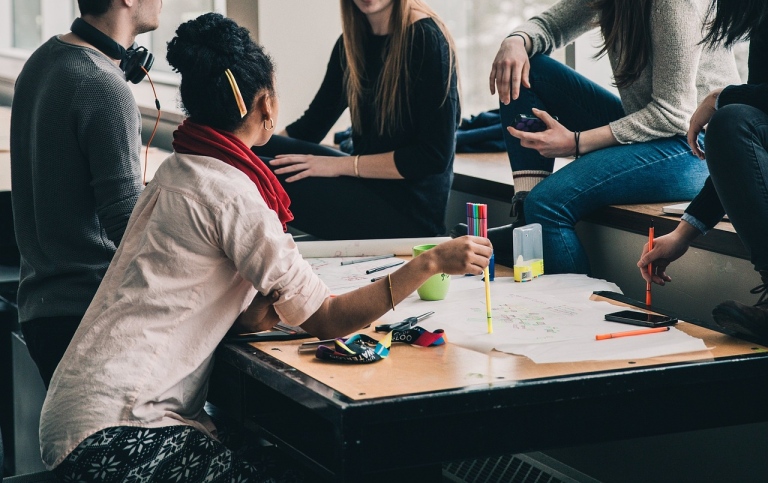 A group working together around a table