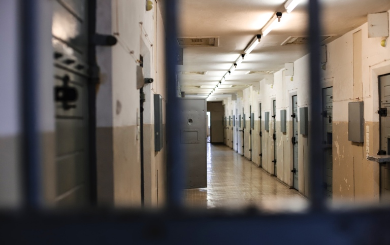 A long hallway with a bunch of lockers in it