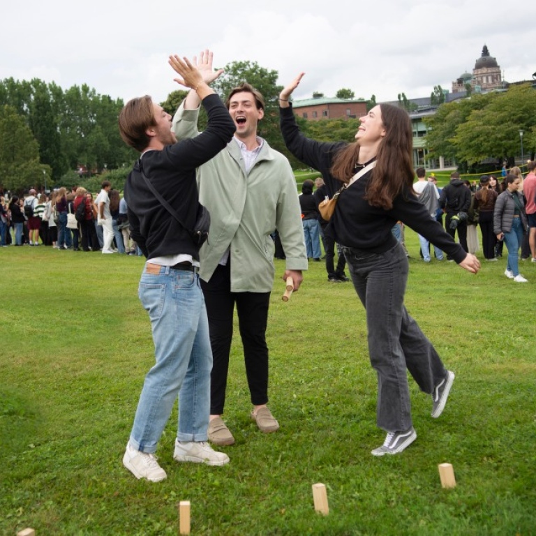 New students playing games on the lawn.